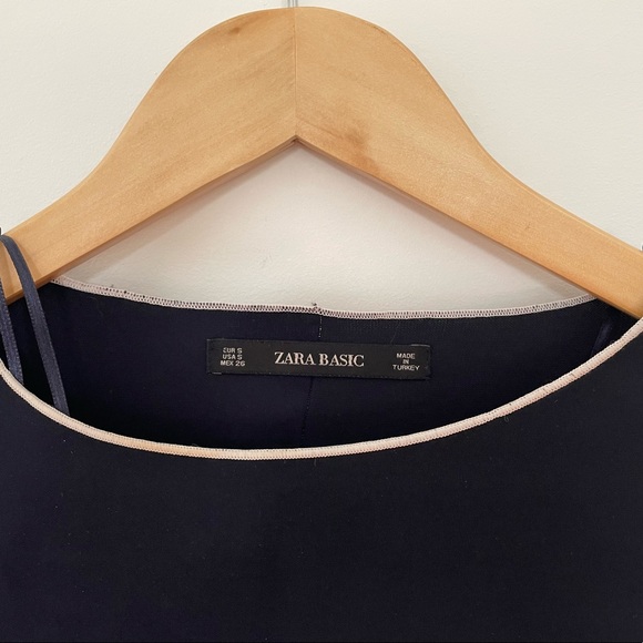 Cute navy long sleeve top with white details and bows on the sleeve from Zara - Picture 2 of 4